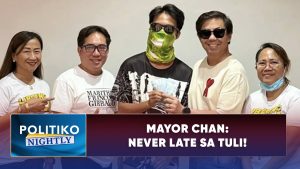 684243770_840167929140936_1339456408312609782_n - POLITIKO Five people posing for a photo; the center person wears a green scarf mask and sunglasses.